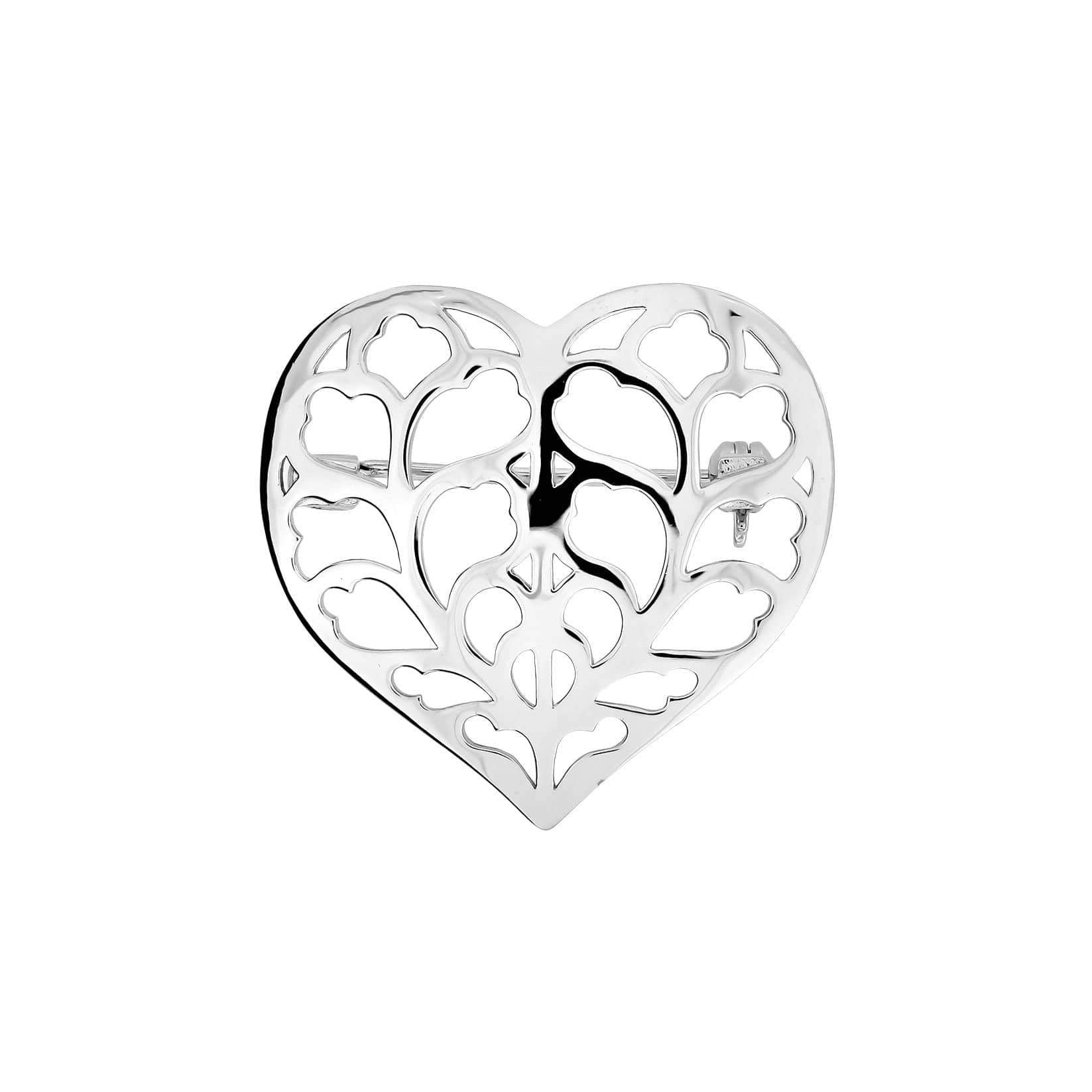 Sterling silver brooch in a sculptural heart shape with intricate openwork inspired by Yorkshire floral motifs, showcasing expert British craftsmanship.