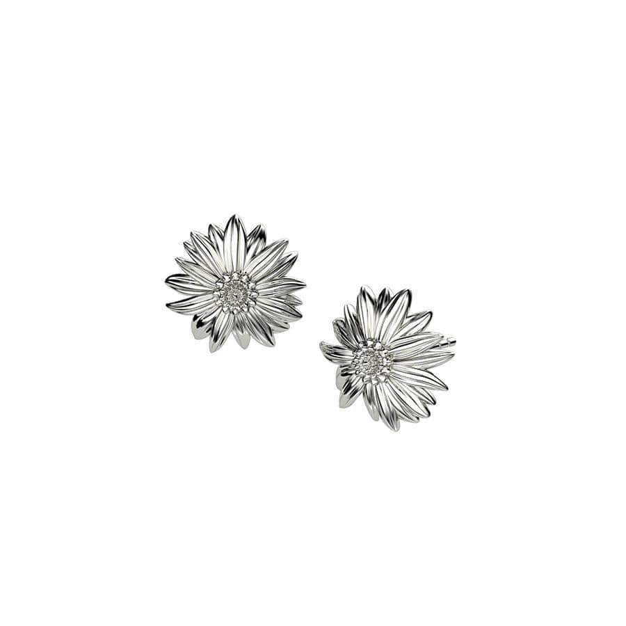 Pair of sterling silver earrings designed as detailed marigold flowers, showcasing expert British craftsmanship and a sculptural floral motif for refined everyday elegance.